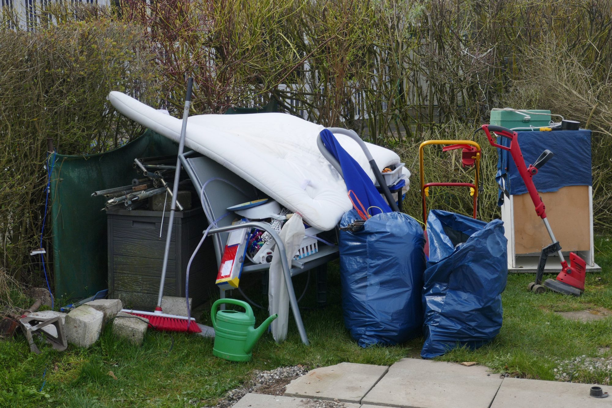 Rubbish, rubble and scrap left behind at a campsite. Ready for removal by the garbage disposal.Germany, Europe